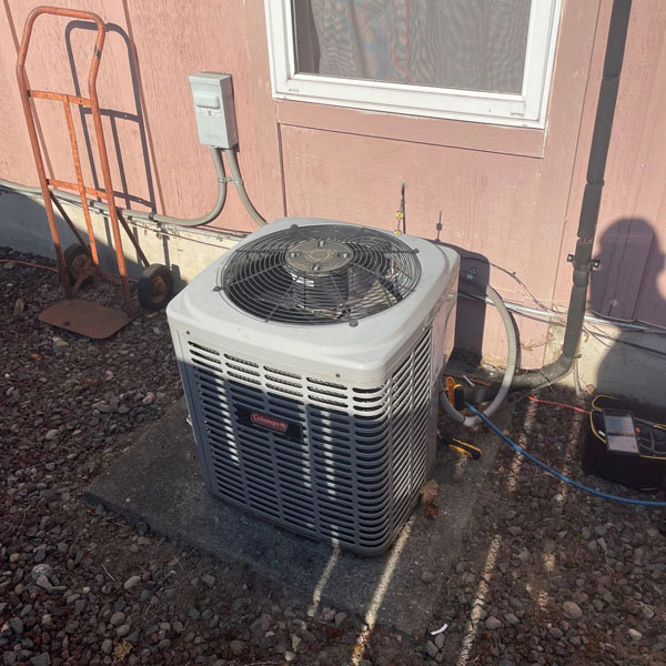 Coleman AC unit outside of residential customer’s home.