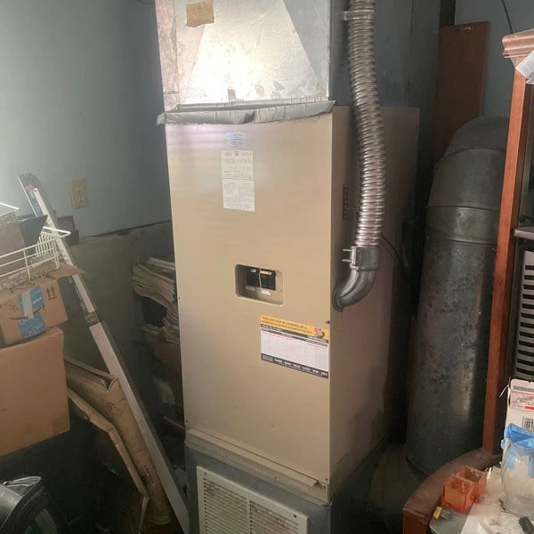 AC add-on unit installed in basement of customer’s home.