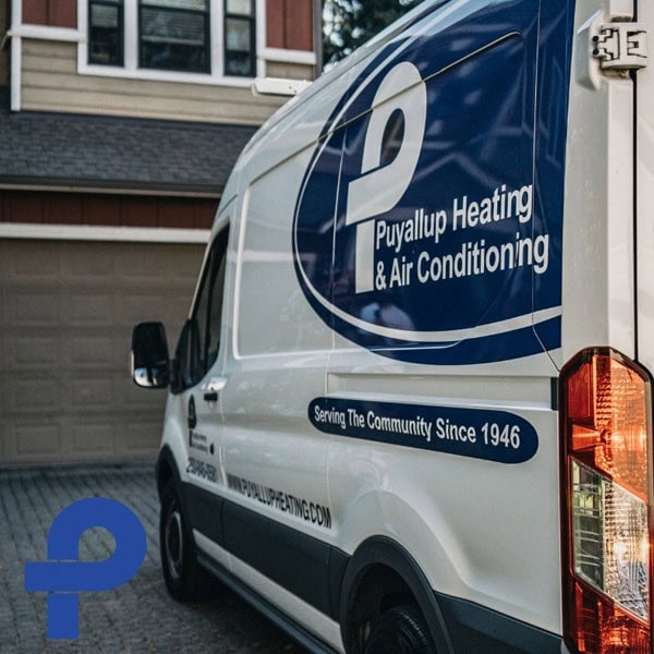 Puyallup HVAC branded van outside of residential property.