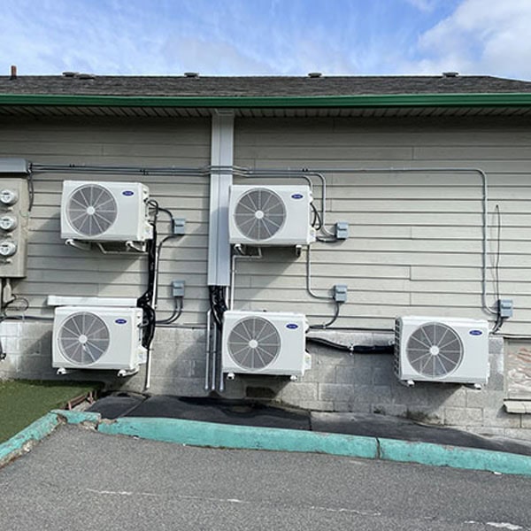 Commercial Cooling 1_600x600 5 AC units installed to outside of commercial property.