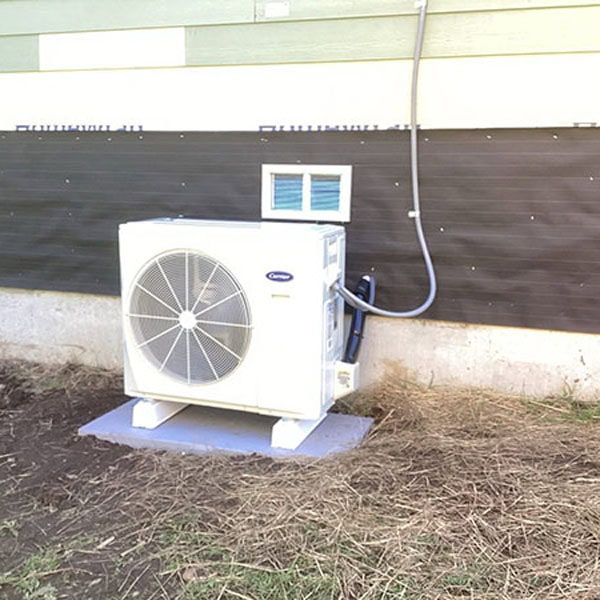 New Carrier ductless system installed outside of new home build.