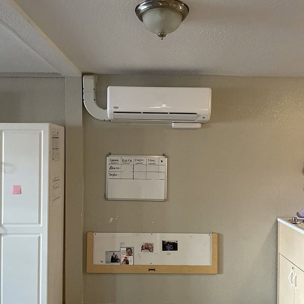 Mini-split unit installed inside of office.